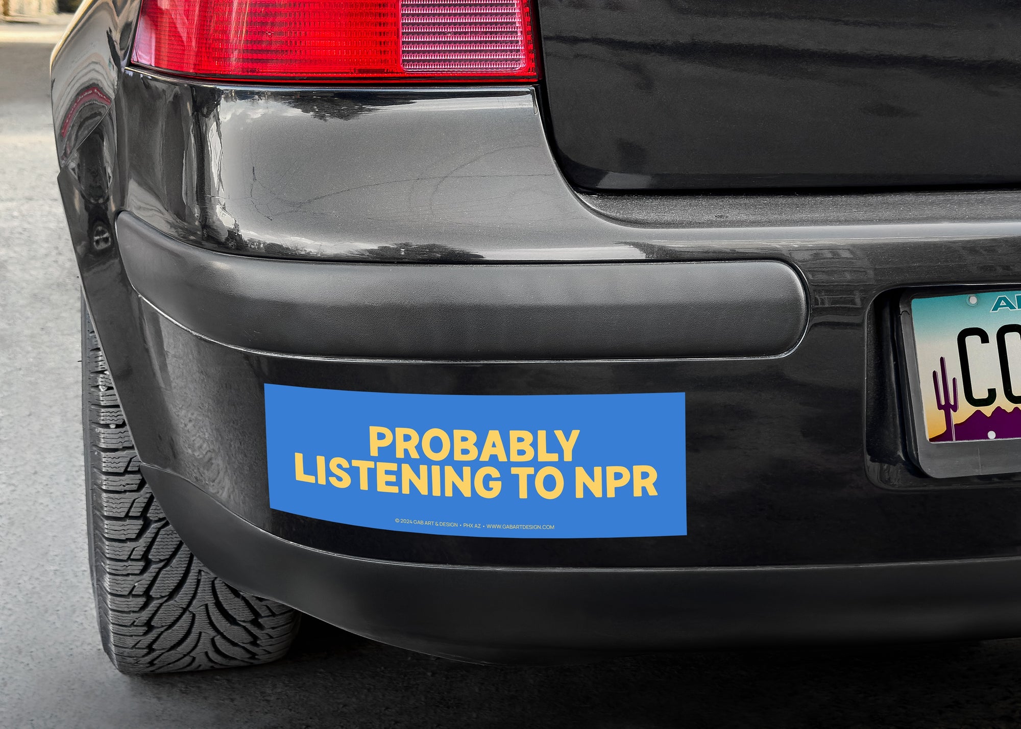 probably listening to npr bumper sticker / magnet